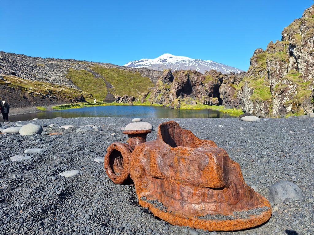 Remains from the shipwreck from 1948 with Djúpalón and Snæfellsjökull glacier in the background.